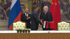 Газовый контракт, сотрудничество в военной сфере - итоги визита Путина в КНР Газовый контракт, сотрудничество в военной сфере - итоги визита Путина в КНР