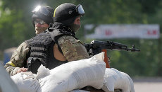 Украинские силовики на блокпосту. Архивное фото Украинские силовики на блокпосту. Архивное фото