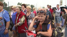 Украинцы стояли в очереди на КПП, чтобы пересечь границу и купить еду в РФ Украинцы стояли в очереди на КПП, чтобы пересечь границу и купить еду в РФ