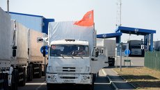 Машины из состава гуманитарного конвоя РФ на российско-украинской границе, архивное фото Машины из состава гуманитарного конвоя РФ на российско-украинской границе, архивное фото