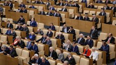 Депутаты на пленарном заседании Государственной Думы РФ. Архивное фото Депутаты на пленарном заседании Государственной Думы РФ. Архивное фото