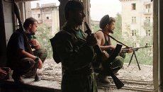 Чеченские боевики во время уличных боев в Грозном Чеченские боевики во время уличных боев в Грозном