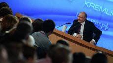 Президент России Владимир Путин на десятой большой ежегодной пресс-конференции Президент России Владимир Путин на десятой большой ежегодной пресс-конференции