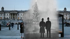 Коллаж из фотографий рождественского Лондона 1948 и 2014 годов. Трафальгарская площадь Коллаж из фотографий рождественского Лондона 1948 и 2014 годов. Трафальгарская площадь