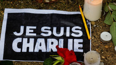 Память жертв теракта в офисе журнала Charlie Hebdo во Франции. Архивное фото Память жертв теракта в офисе журнала Charlie Hebdo во Франции. Архивное фото