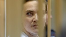 Украинская летчица Надежда Савченко, обвиняемая в причастности к убийству российских журналистов. Архивное фото Украинская летчица Надежда Савченко, обвиняемая в причастности к убийству российских журналистов. Архивное фото