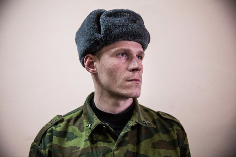 Ополченец в штабе батальона Кальмиус в Донецке Ополченец в штабе батальона Кальмиус в Донецке