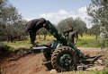 Боевики на позиции возле города Идлиб, Сирия Боевики на позиции возле города Идлиб, Сирия