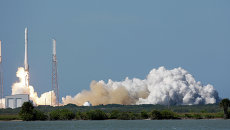 Старт ракеты SpaceX Falcon 9. Архивное фото Старт ракеты SpaceX Falcon 9. Архивное фото
