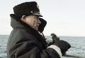 Президент РФ Владимир Путин на ходовом мостике атомной подводной лодки Карелия Президент РФ Владимир Путин на ходовом мостике атомной подводной лодки Карелия