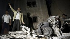 Место взрыва заминированного автомобиля в столице Йемена Сане Место взрыва заминированного автомобиля в столице Йемена Сане