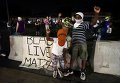 Протесты в Фергюсоне, США Протесты в Фергюсоне, США
