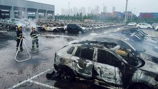 На месте взрывов на складе опасных веществ в промышленном городе Тяньцзинь в Китае На месте взрывов на складе опасных веществ в промышленном городе Тяньцзинь в Китае