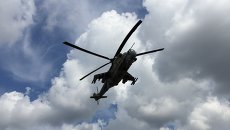 Российский ударный вертолет Ми-24 в небе. Архивное фото Российский ударный вертолет Ми-24 в небе. Архивное фото