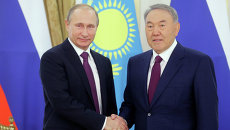 15 октября 2015. Президент России Владимир Путин и президент Казахстана Нурсултан Назарбаев во время встречи 15 октября 2015. Президент России Владимир Путин и президент Казахстана Нурсултан Назарбаев во время встречи