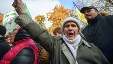 Сторонники партии УКРОП во время митинга в поддержку лидера партии Геннадия Корбана у здания СИЗО службы безопасности Украины Сторонники партии УКРОП во время митинга в поддержку лидера партии Геннадия Корбана у здания СИЗО службы безопасности Украины