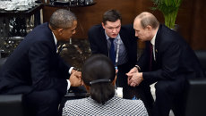 Президент России Владимир Путин во время беседы с президентом США Бараком Обамой на полях саммита Группы двадцати (G20) Президент России Владимир Путин во время беседы с президентом США Бараком Обамой на полях саммита Группы двадцати (G20)