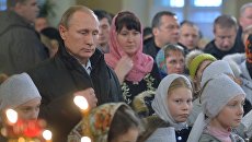 Президент РФ В. Путин на Рождественском богослужении Президент РФ В. Путин на Рождественском богослужении