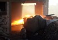 Выстрел артиллерийского орудия во время штурма населенного пункта Осман в провинции Дераа Выстрел артиллерийского орудия во время штурма населенного пункта Осман в провинции Дераа