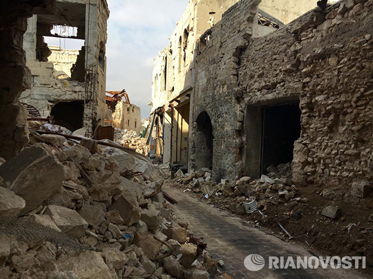 На улице старого рынка в историческом центре в Алеппо На улице старого рынка в историческом центре в Алеппо