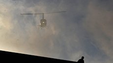 Вертолет Robinson R66. Архивное фото Вертолет Robinson R66. Архивное фото