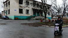 Один из домов, который был обстрелян украинскими силовиками. Архивное фото Один из домов, который был обстрелян украинскими силовиками. Архивное фото