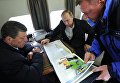 Президент России Владимир Путин (в центре) во время облета транспортного перехода через Керченский пролив. Слева - заместитель председателя правительства РФ Дмитрий Козак Президент России Владимир Путин (в центре) во время облета транспортного перехода через Керченский пролив. Слева - заместитель председателя правительства РФ Дмитрий Козак