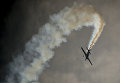 Самолет авиационной пилотажной группы ВВС Чили Halcones во время выступления на международном аэрокосмическом салоне Латинской Америки FIDAE в аэропорту Сантьяго Самолет авиационной пилотажной группы ВВС Чили Halcones во время выступления на международном аэрокосмическом салоне Латинской Америки FIDAE в аэропорту Сантьяго