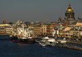У пристани ледоколы Мудьюг (на первом плане) и Иван Крузенштерн во время фестиваля ледоколов на реке Неве в Санкт-Петербурге У пристани ледоколы Мудьюг (на первом плане) и Иван Крузенштерн во время фестиваля ледоколов на реке Неве в Санкт-Петербурге