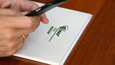 Папка с символикой Международной ассоциации легкоатлетических федераций (IAAF). Архивное фото Папка с символикой Международной ассоциации легкоатлетических федераций (IAAF). Архивное фото