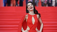 Актриса и певица Наталья Орейро перед началом церемонии закрытия 38-го Московского международного кинофестиваля Актриса и певица Наталья Орейро перед началом церемонии закрытия 38-го Московского международного кинофестиваля