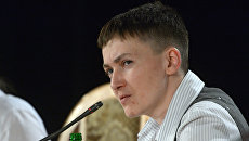 Украинская военнослужащая Надежда Савченко на пресс-конференции в Киеве. Архивное фото Украинская военнослужащая Надежда Савченко на пресс-конференции в Киеве. Архивное фото
