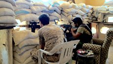 Бойцы сирийской армии на передовой позиции на юге Алеппо в Сирии. Август 2016 Бойцы сирийской армии на передовой позиции на юге Алеппо в Сирии. Август 2016