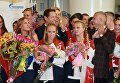 Президент Олимпийского комитета России Александр Жуков и члены олимпийской сборной России во время церемонии встречи в аэропорту Шереметьево Президент Олимпийского комитета России Александр Жуков и члены олимпийской сборной России во время церемонии встречи в аэропорту Шереметьево