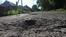 Последствия обстрела Куйбышевского района Донецка украинскими силовиками. Архивное фото Последствия обстрела Куйбышевского района Донецка украинскими силовиками. Архивное фото