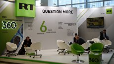 Стенд телеканала RT. Архивное фото Стенд телеканала RT. Архивное фото