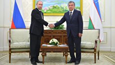 Владимир Путин и Шавкат Мирзиёев. Архивное фото Владимир Путин и Шавкат Мирзиёев. Архивное фото
