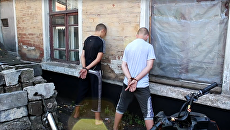 Стоп-кадр с видео задержания подростков-диверсантов в ДНР Стоп-кадр с видео задержания подростков-диверсантов в ДНР