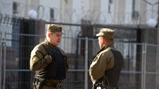 Сотрудники службы безопасности у посольства Российской Федерации в Киеве Сотрудники службы безопасности у посольства Российской Федерации в Киеве