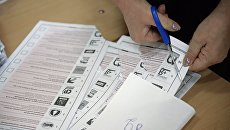 Подсчет голосов в единый день голосования. Архивное фото Подсчет голосов в единый день голосования. Архивное фото