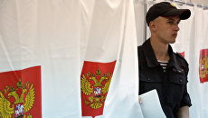 Избирательный участок в Симферополе в единый день голосования. Архивное фото Избирательный участок в Симферополе в единый день голосования. Архивное фото