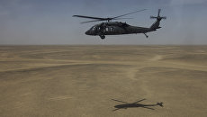 Американский многоцелевой вертолет Sikorsky UH-60 Black Hawk (Черный ястреб). Архивное фото Американский многоцелевой вертолет Sikorsky UH-60 Black Hawk (Черный ястреб). Архивное фото
