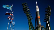 Installation of the carrier rocket Soyuz-FG with transport manned spacecraft Soyuz MS-02 in the launcher at the launch site Baikonur Cosmodrome.  Archival photo