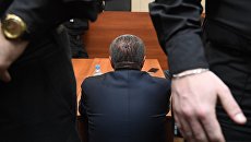 Министр экономического развития РФ Алексей Улюкаев в здании Басманного суда города Москвы Министр экономического развития РФ Алексей Улюкаев в здании Басманного суда города Москвы