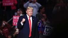 Избранный президент США Дональд Трамп на встрече с избирателями в городе Херши (штат Пенсильвания) в рамках тура the USA Thank You Tour Избранный президент США Дональд Трамп на встрече с избирателями в городе Херши (штат Пенсильвания) в рамках тура the USA Thank You Tour