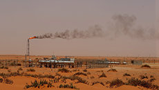 Добыча нефти в Саудовской Аравии. Архивное фото Добыча нефти в Саудовской Аравии. Архивное фото