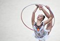 Дина Аверина (Россия) выполняет упражнение с обручем в финале индивидуальной программы по художественной гимнастики Гран-при Москвы Дина Аверина (Россия) выполняет упражнение с обручем в финале индивидуальной программы по художественной гимнастики Гран-при Москвы