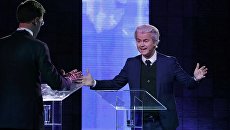 Премьер-министр Нидерландов Марк Рютте и лидер ультраправой Партии свободы Герт Вилдерс во время дебатов. Архивное фото Премьер-министр Нидерландов Марк Рютте и лидер ультраправой Партии свободы Герт Вилдерс во время дебатов. Архивное фото