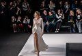 Модель на показе коллекции одежды бренда Speranza Couture дизайнера Надежды Юсуповой в рамках Mercedes-Benz Fashion Week Russia Модель на показе коллекции одежды бренда Speranza Couture дизайнера Надежды Юсуповой в рамках Mercedes-Benz Fashion Week Russia