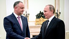 Президент РФ Владимир Путин и президент Республики Молдова Игорь Додон во время встречи. 17 марта 2017 Президент РФ Владимир Путин и президент Республики Молдова Игорь Додон во время встречи. 17 марта 2017